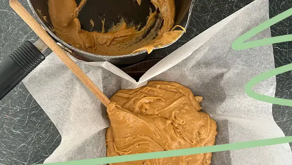 spread fudge into baking pan