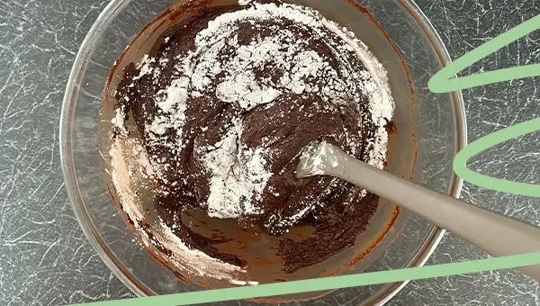 mix powdered sugar into vegan fudge